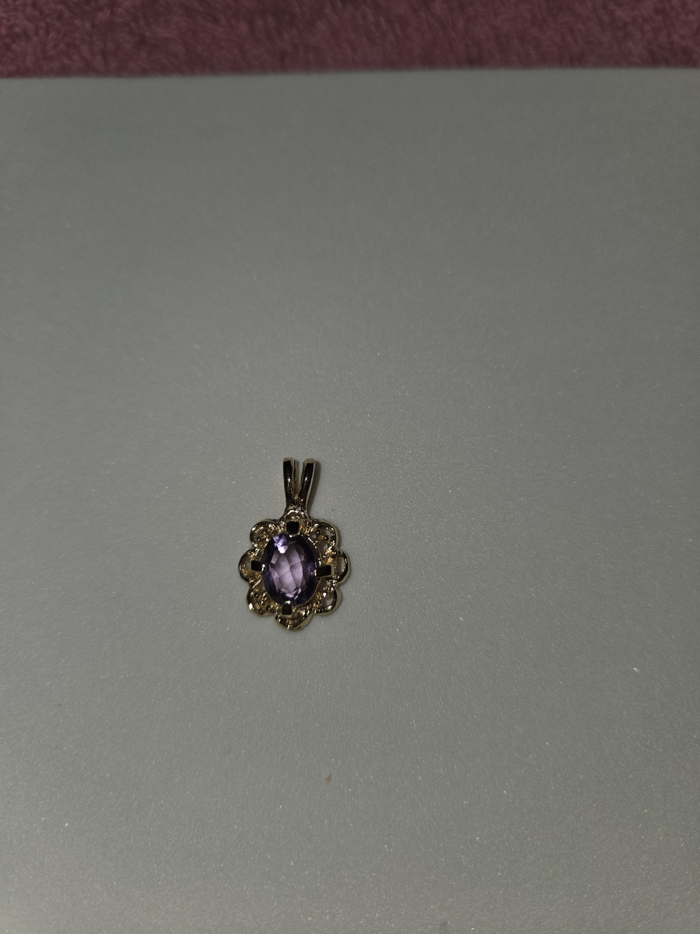 Gold Pendant Necklace with Purple Oval Gemstone